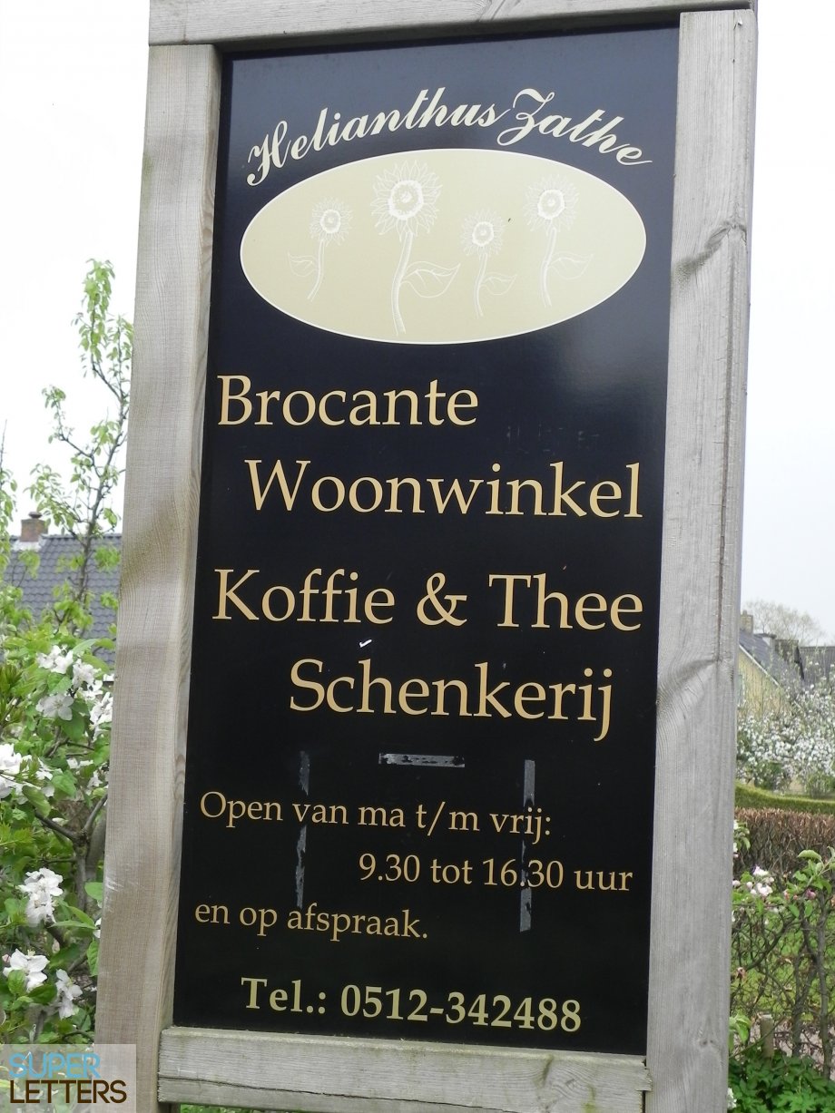 reclamebord plakletters | Helianthus Zathe reclamebord plakken | Helianthus Zathe